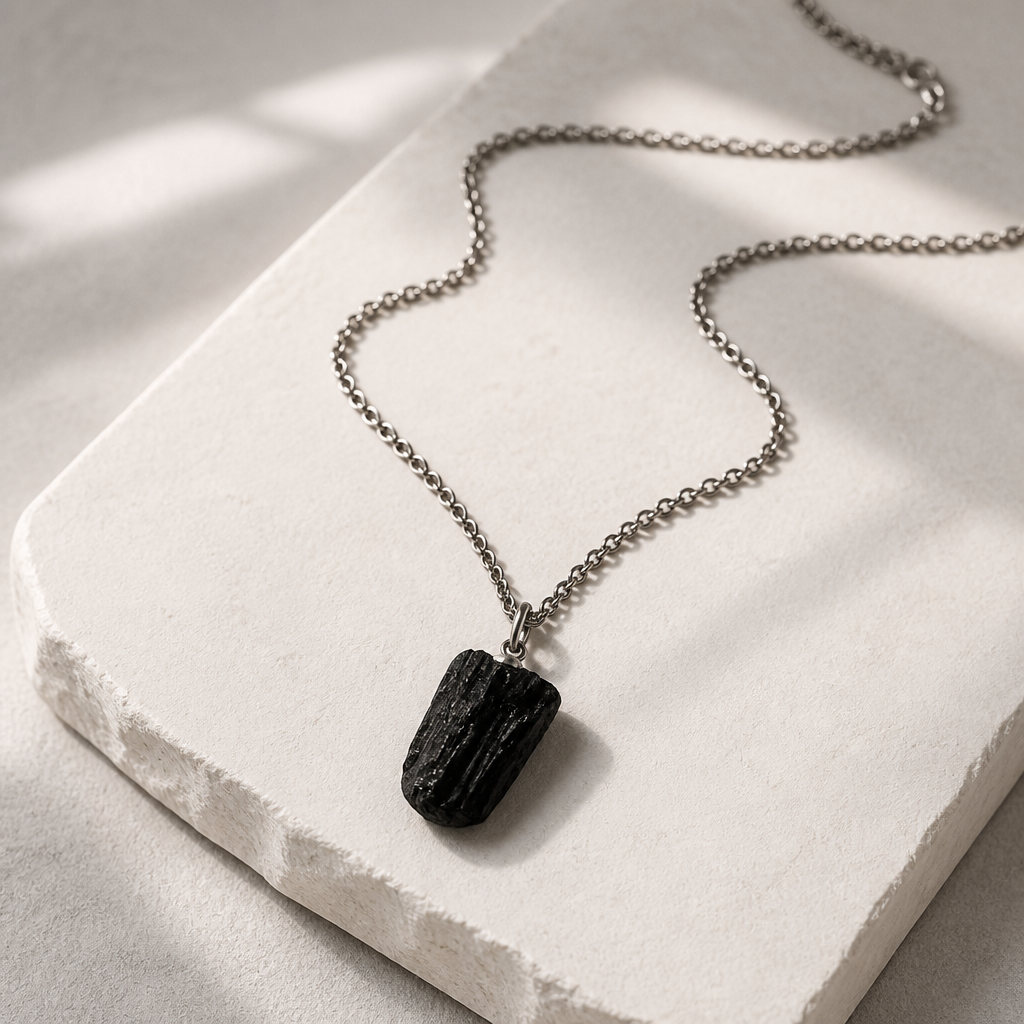 RAW TOURMALINE PENDANT ON A STAINLESS STEEL CHAIN